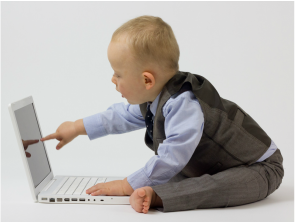 Baby Boy Touching Laptop Computer